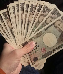 David holding 200,000 yen - roughly $2,200.
