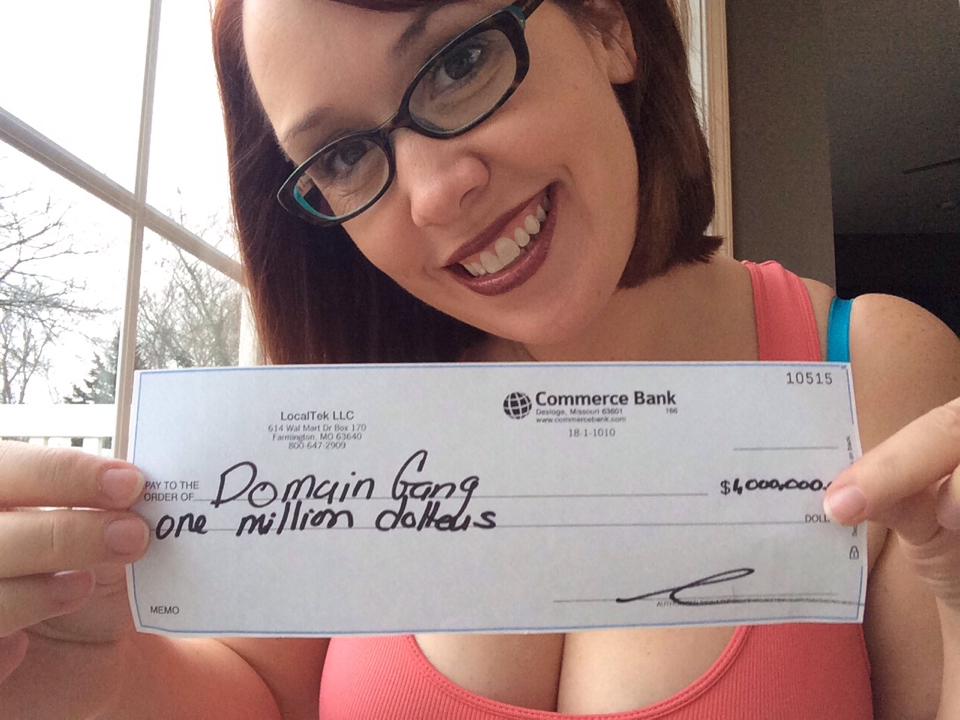 Tiffany Marler, holding the $1,000,000 check paid to DomainGang.