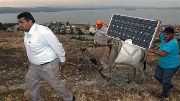 Shepherds in Izmir, Turkey, use donkeys to haul solar panels around as charging stations.