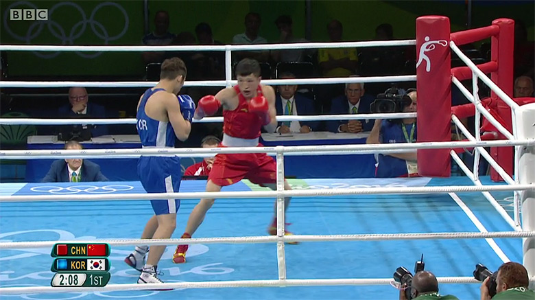 Chinese boxing against Koreans. Photo courtesy BBC. 